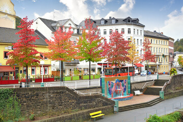  Autumn landscape in the town of Bad Ems. Lan River embankment. Trees, autumn colors.