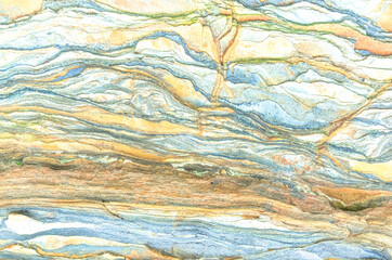 Rock layers - a colorful formations of rocks stacked over the hundreds of years. Interesting background with fascinating texture
