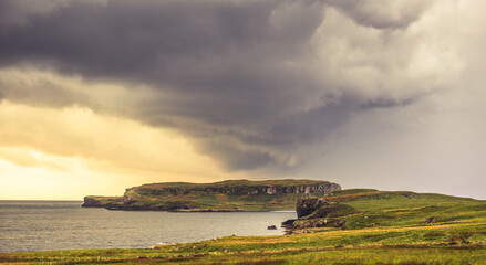 Heavy storm clouds over Scottish island