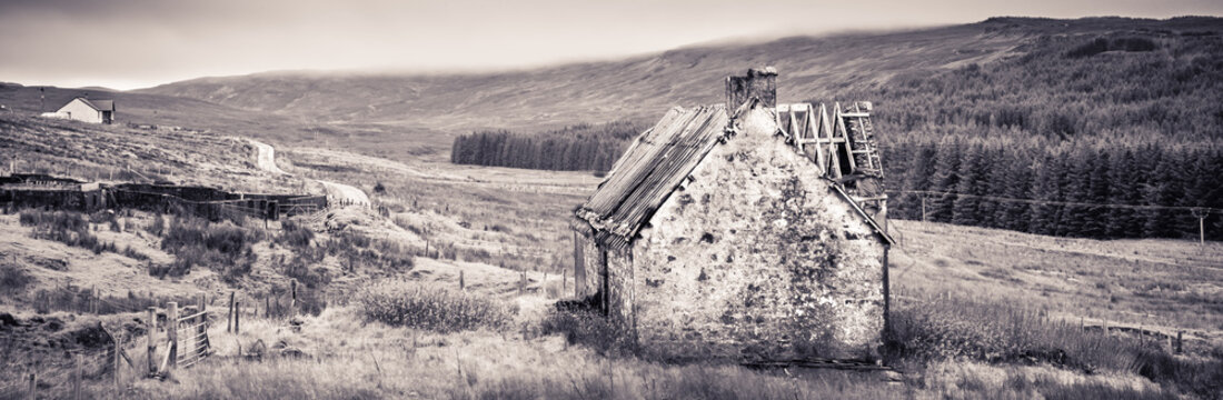 An old abandoned house on a farm yard