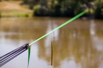 Equipment for slackline Slackline sling next to the machine and protection for the tree. stretched colored slackline in the autumn forest
Sports a tightrope or slackline outdoor in a city park.