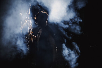 Obraz premium Sorcerer with marks on his body in the forest