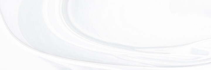 White gray satin texture that is white silver fabric silk panorama background with beautiful soft blur pattern natural.