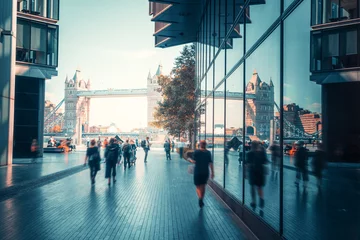Foto op Plexiglas Tower Bridge business people, modern buildings and Tower Bridge, London, UK