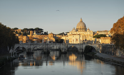 Fototapeta premium Tiber and St Peter Basilica in Vatican, sunrise time