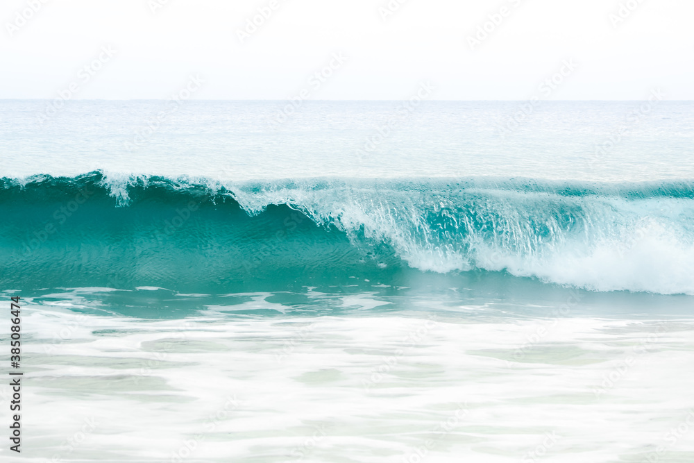 Sticker Crushing ocean waves on a sunny day