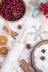 Top view of ingredients for Christmas cranberry pie. Location vertical.