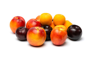 Fototapeta na wymiar nectarine, peach and plum on a white background