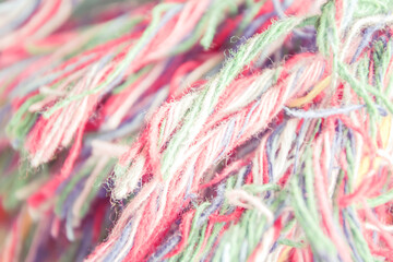 The multicolored yarn used for knitting clothes