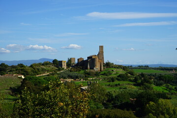 Fototapeta na wymiar Ancient wall ruins in a clear sky day, Tuscania, Viterbo, Lazio, Italy