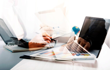 businesswoman hand using smart phone, tablet payments and holding credit card online shopping, omni channel, digital tablet docking keyboard computer at office in sun light