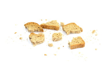 Bread crumbs, wholemeal bread isolated on a white background. leftover bread.