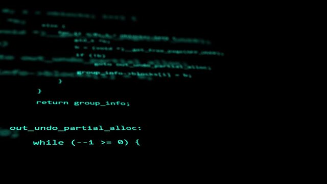 Close up monitor of developing programming and coding technologies. Programmer is typing on keyboard. Screen code view. Programmer concepts.