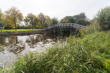 Fototapeta na wymiar The Wilhelminabrug bridge over the Gein river in Abcoude, The Netherlands