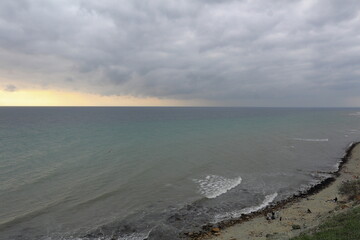 seascape on a cloudy evening in pastel colors