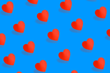 Pattern of paper hearts on a bright background. The concept of Valentine's day