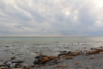 seascape on a cloudy evening in pastel colors