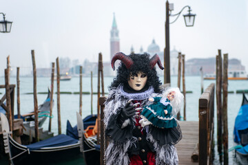 Scary carnival mask at the traditional festival in Venice, Italy