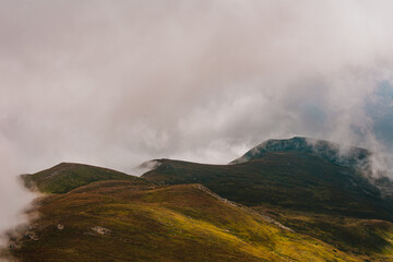 Fototapeta na wymiar Magical overcast landscape of the Montenegrin ridge in the Carpathians, picturesque landscapes from Gutin Tomnatych, the Carpathians after the summer morning rain.