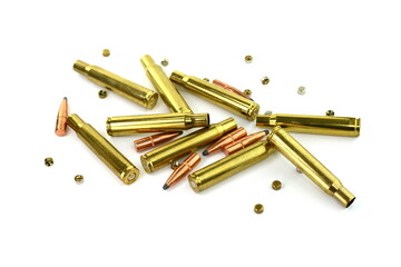 Hunting ammunition isolated on white. A rifle bullet, empty shell, gunpowder on white background. 