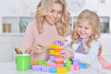 Portrait of little girl and her mother