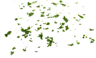 Fresh green chopped parsley leaves isolated on white background. Chopped parsley on a white background isolated.   Chopped Parsley Leaves. Fresh Herbs 