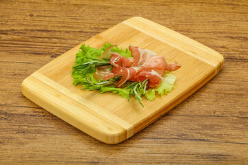 Sliced pork Jamon with rosemary