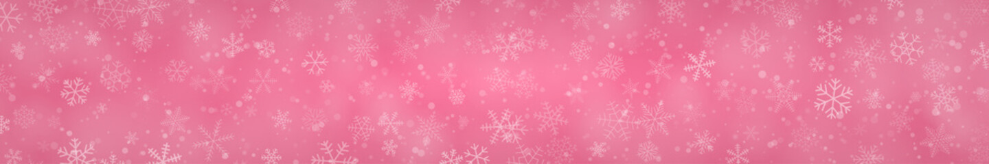 Christmas banner of snowflakes of different shapes, sizes and transparency on pink background