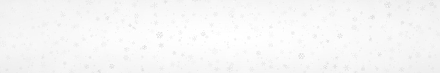 Fototapeta premium Christmas banner of snowflakes of different shapes, sizes and transparency on gray background