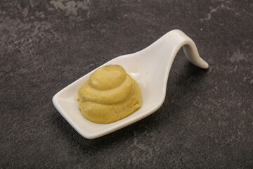 Dijon mustard sauce in the bowl