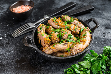 Stew with Chicken Neck meat and vegetables. Black background. Top view