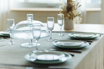 A Stylish table setting with dried flowers.