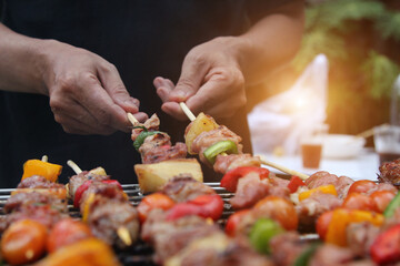 Barbeque Grill Street Food in thailand,Eat outdoors in a happy family.