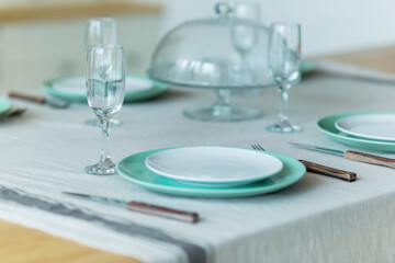 Elegant table setting dinner for an event party or family celebration at home