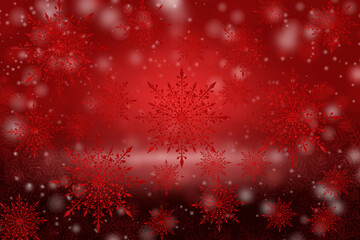 Decorated snowflakes on blurred red background with bokeh.