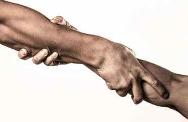 Two hands, helping arm of a friend, teamwork. Helping hand concept and international day of peace, support. Helping hand outstretched, isolated arm, salvation. Close up help hand