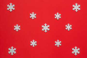 Red Christmas background with silver snowflakes. Elegant Christmas greeting card.with copy space for your text.