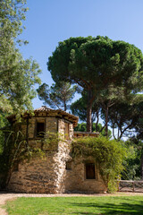 Vertical view of old house, a sunny day, in El Capricho park, in Madrid, Spain