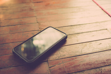smart phone on wooden table