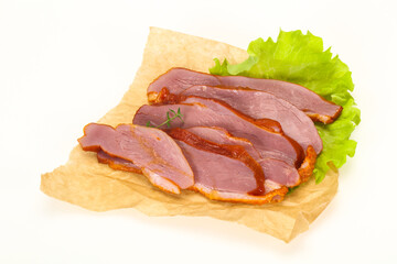 Sliced smoked duck breast served salad