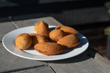 Salgados, salgadinhos, brazilian snacks and party finger food, rissoles, coxinhas, bolinhas de queijo.