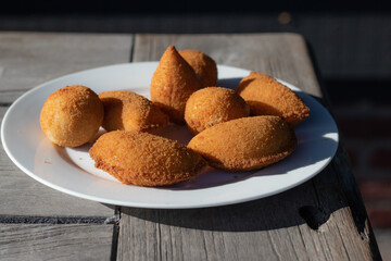 Salgados, salgadinhos, brazilian snacks and party finger food, rissoles, coxinhas, bolinhas de queijo.