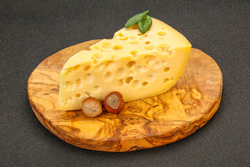 Maasdam cheese - yellow triangle with holes