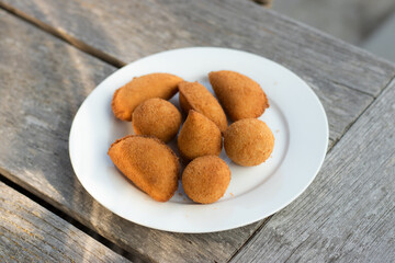 Salgados, salgadinhos, brazilian snacks and party finger food, rissoles, coxinhas, bolinhas de queijo.