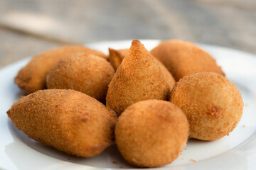 Salgados, salgadinhos, brazilian snacks and party finger food, rissoles, coxinhas, bolinhas de queijo.