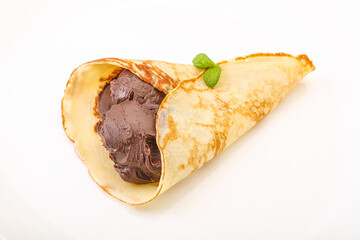 Tasty sweet pancake with nutella