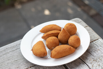 Salgados, salgadinhos, brazilian snacks and party finger food, rissoles, coxinhas, bolinhas de queijo.