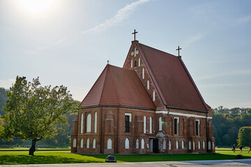 Fototapeta na wymiar Zapyskis church in the empty field near the river 