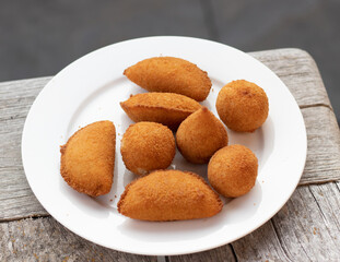 Salgados, salgadinhos, brazilian snacks and party finger food, rissoles, coxinhas, bolinhas de queijo.