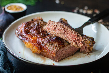 beef steak ribeye grilled veal juicy fried meat tasty top view copy space for text food background rustic